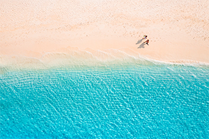 People walking on a beach - Above POV